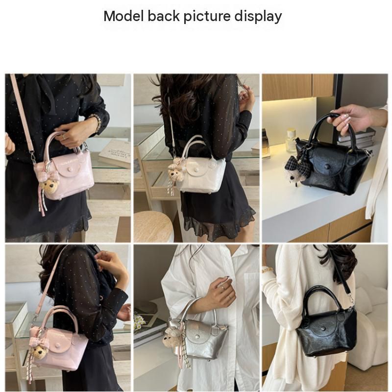 Black Compact PU Leather Crossbody Bag With a pendant- Lightweight Handheld Shoulder Purse with Adjustable Strap, Zipper Closure and Metal Feet for Women, Daily Commute and Travel