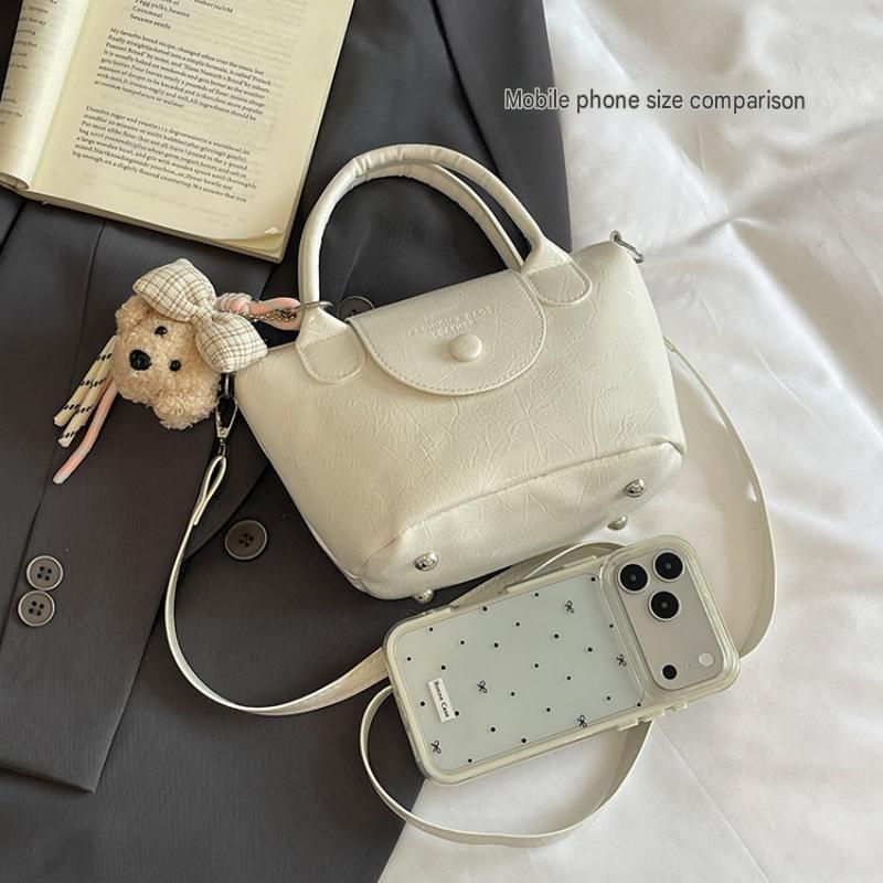 White Compact PU Leather Crossbody Bag With a pendant- Lightweight Handheld Shoulder Purse with Adjustable Strap, Zipper Closure and Metal Feet for Women, Daily Commute and Travel